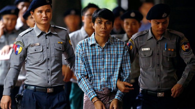 Detained Reuters journalist Kyaw Soe Oo arrives at Insein court in Yangon, Myanmar July 24, 2018. REUTERS/Ann Wang